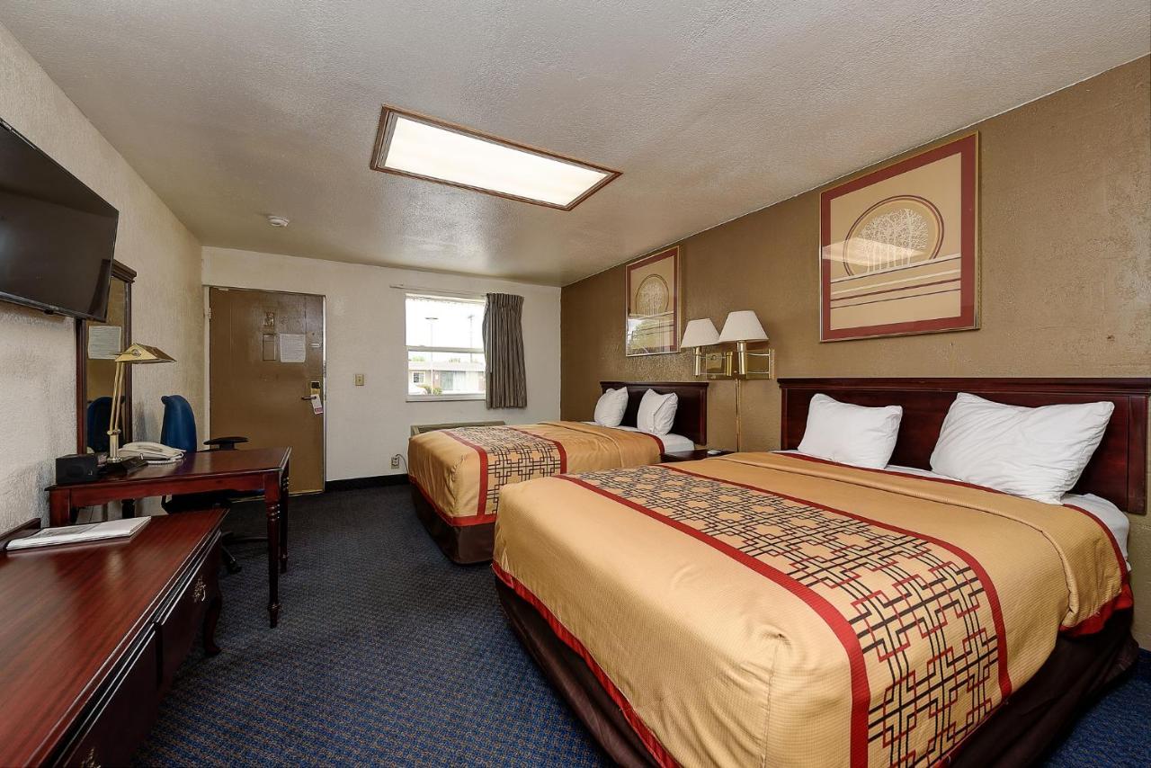 Guest Inn Rogers Esterno foto