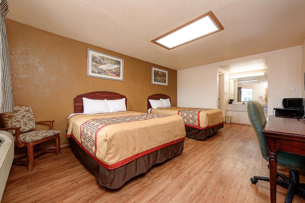 Guest Inn Rogers Esterno foto