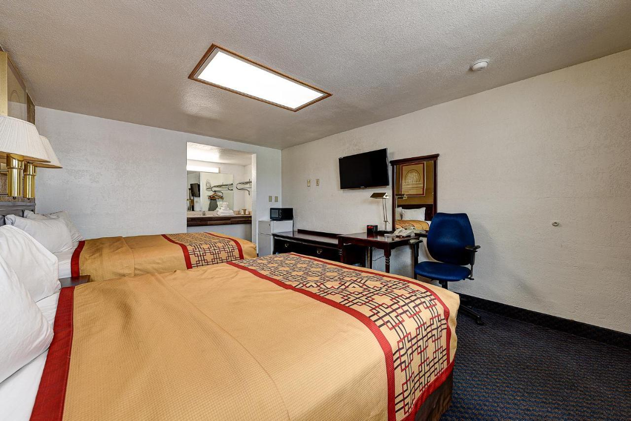 Guest Inn Rogers Esterno foto