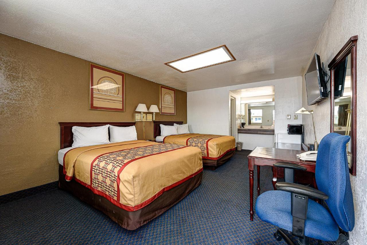 Guest Inn Rogers Esterno foto