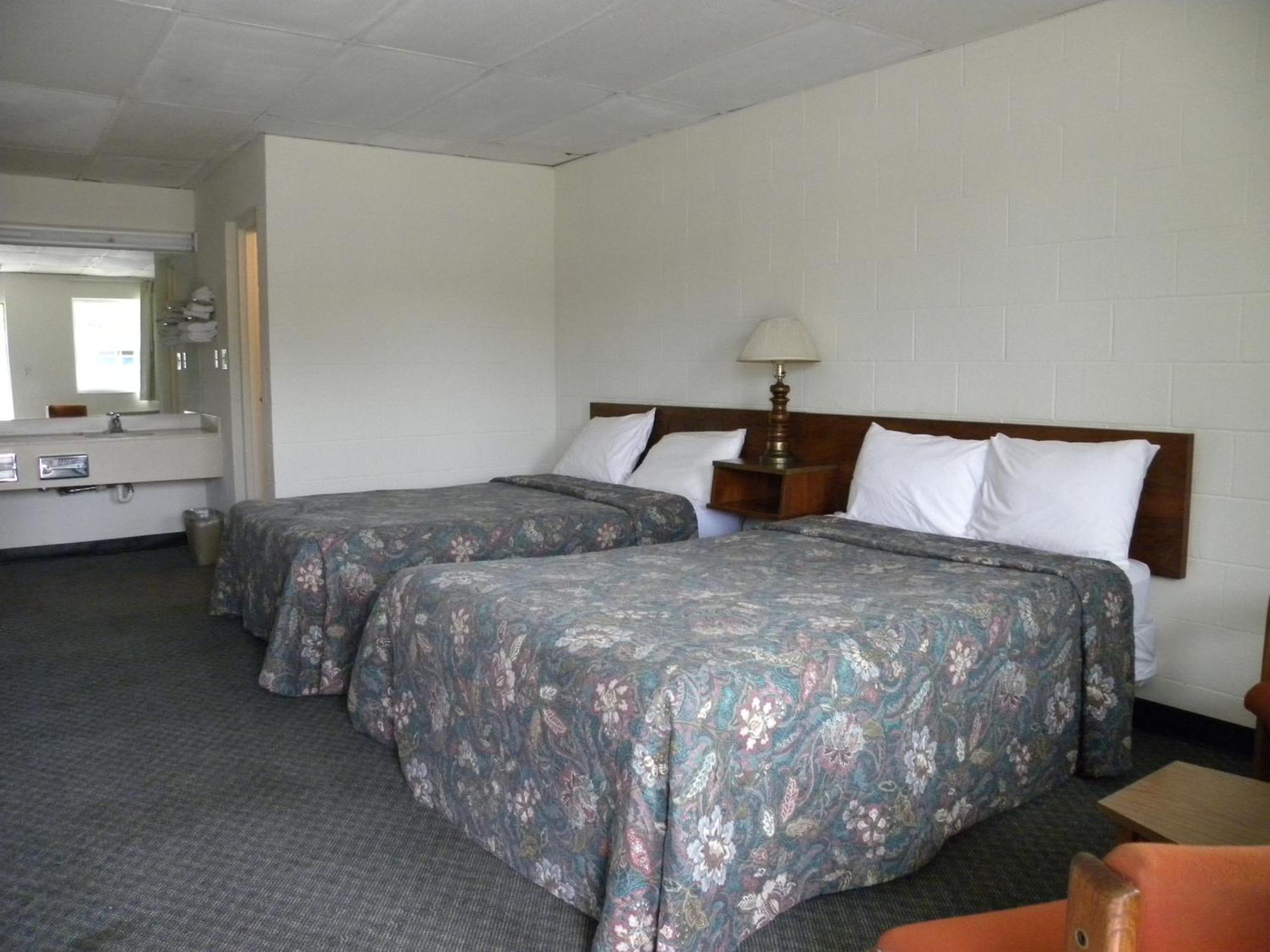 Guest Inn Rogers Esterno foto
