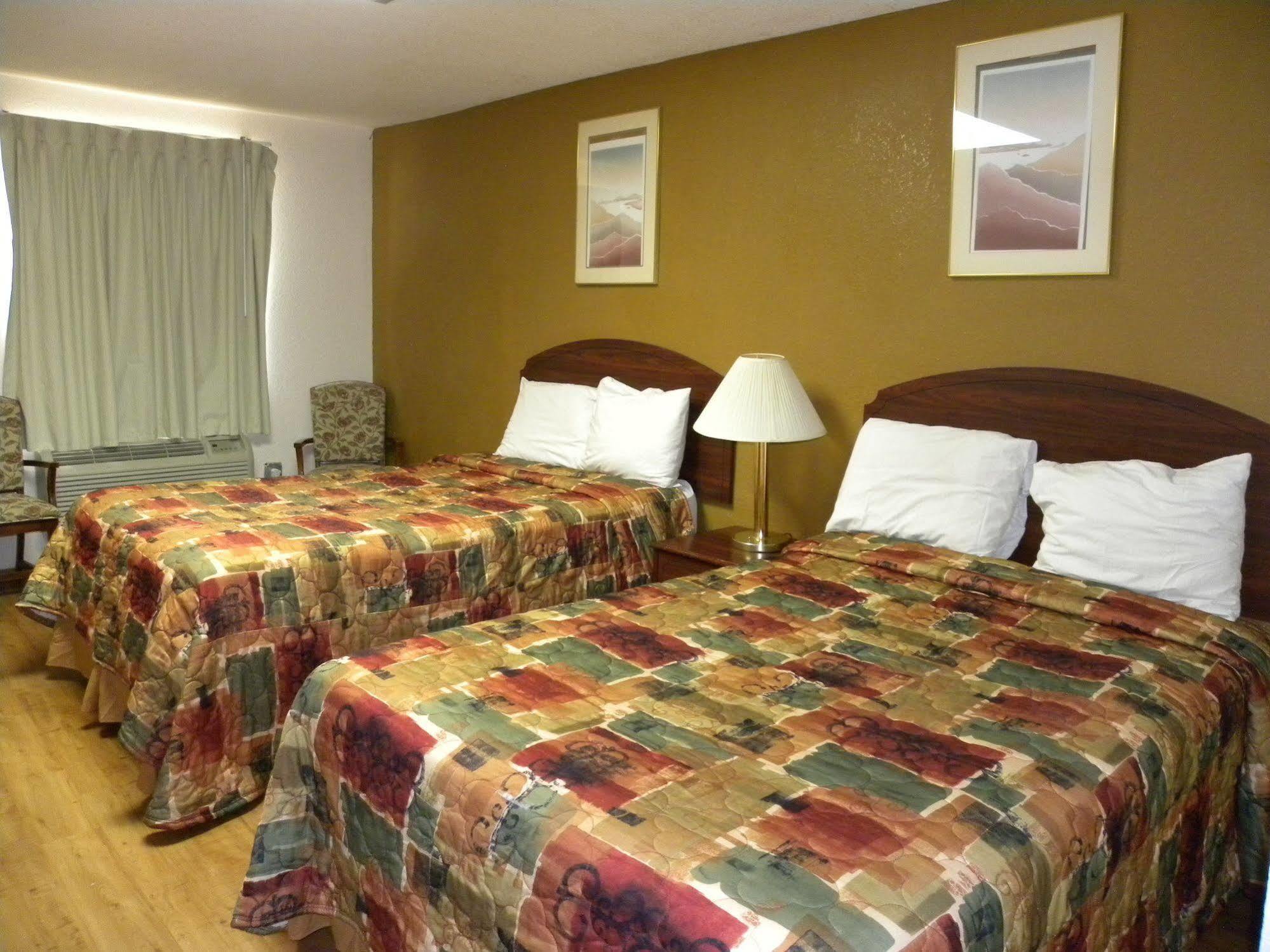 Guest Inn Rogers Esterno foto