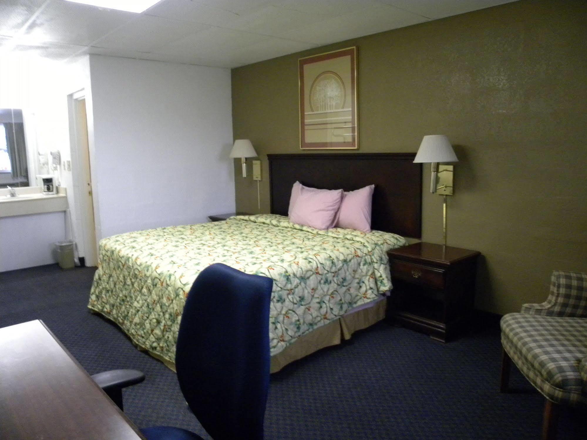 Guest Inn Rogers Esterno foto