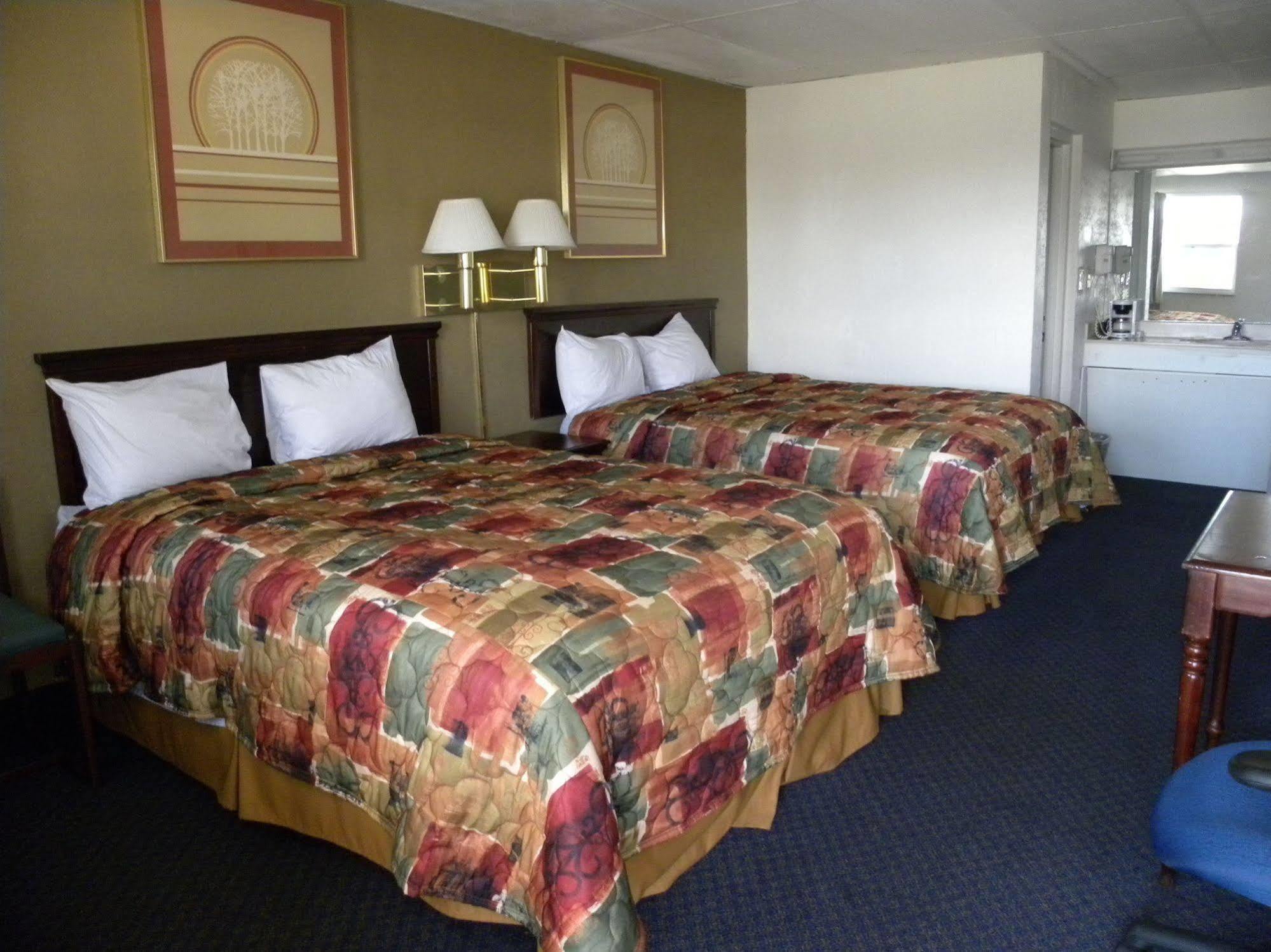 Guest Inn Rogers Esterno foto