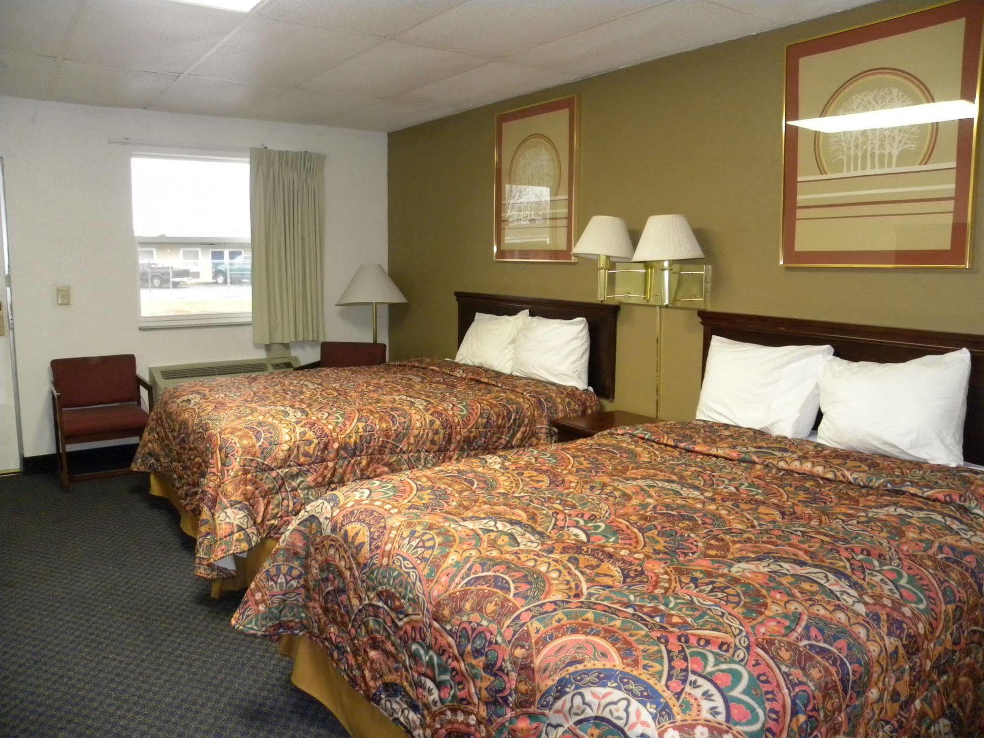 Guest Inn Rogers Esterno foto