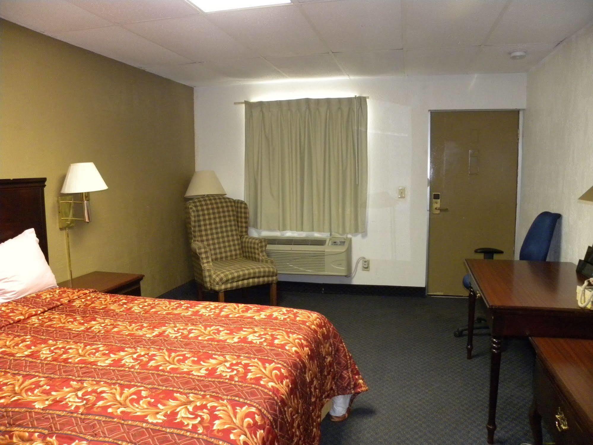 Guest Inn Rogers Esterno foto