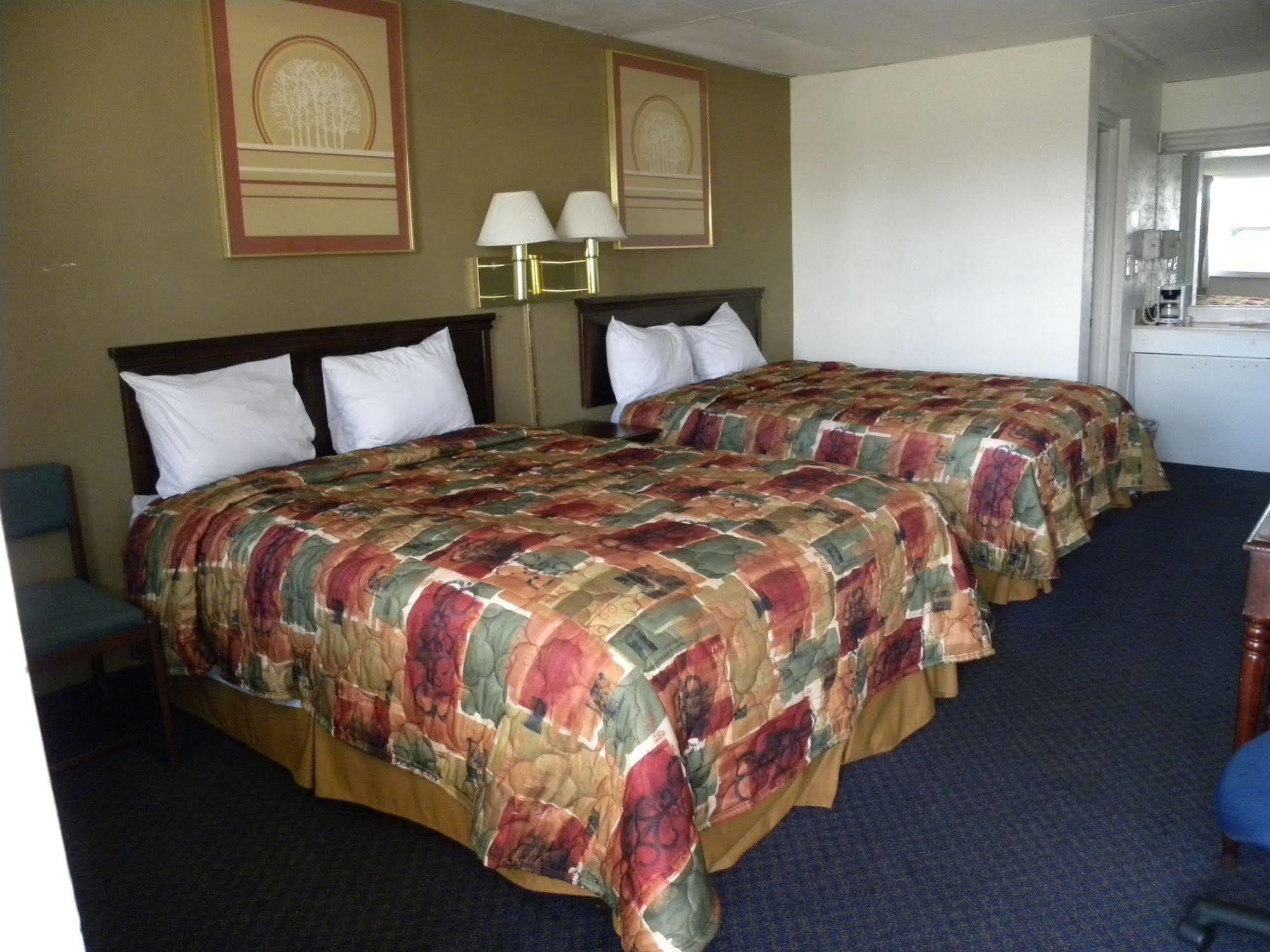 Guest Inn Rogers Esterno foto