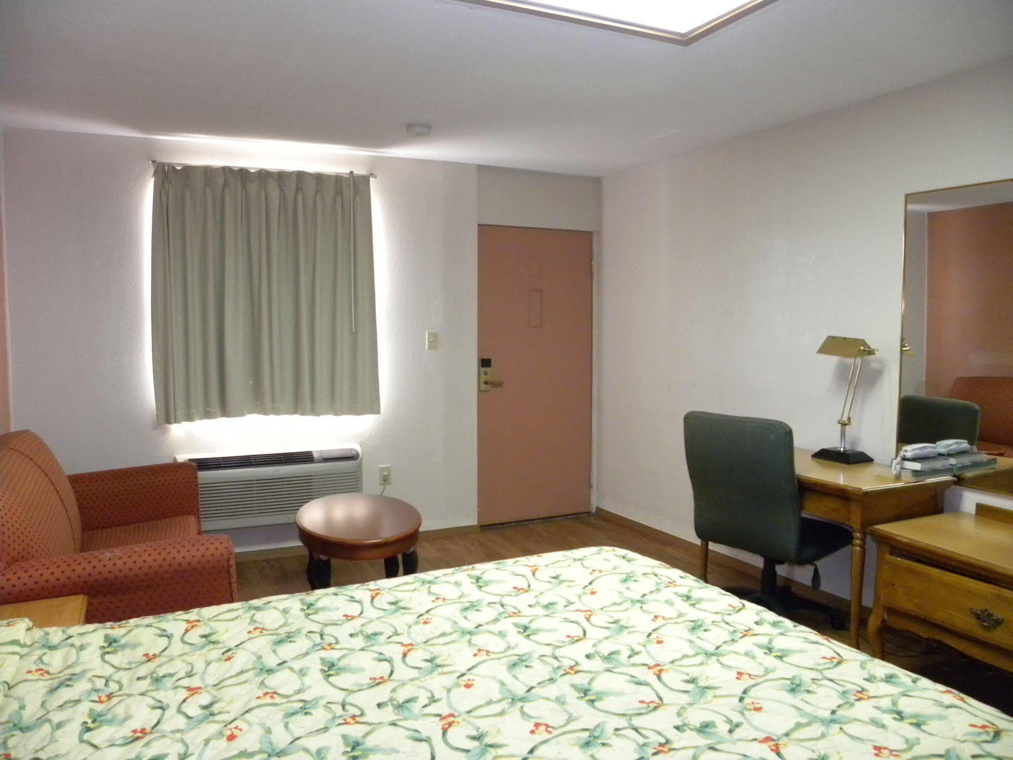 Guest Inn Rogers Esterno foto