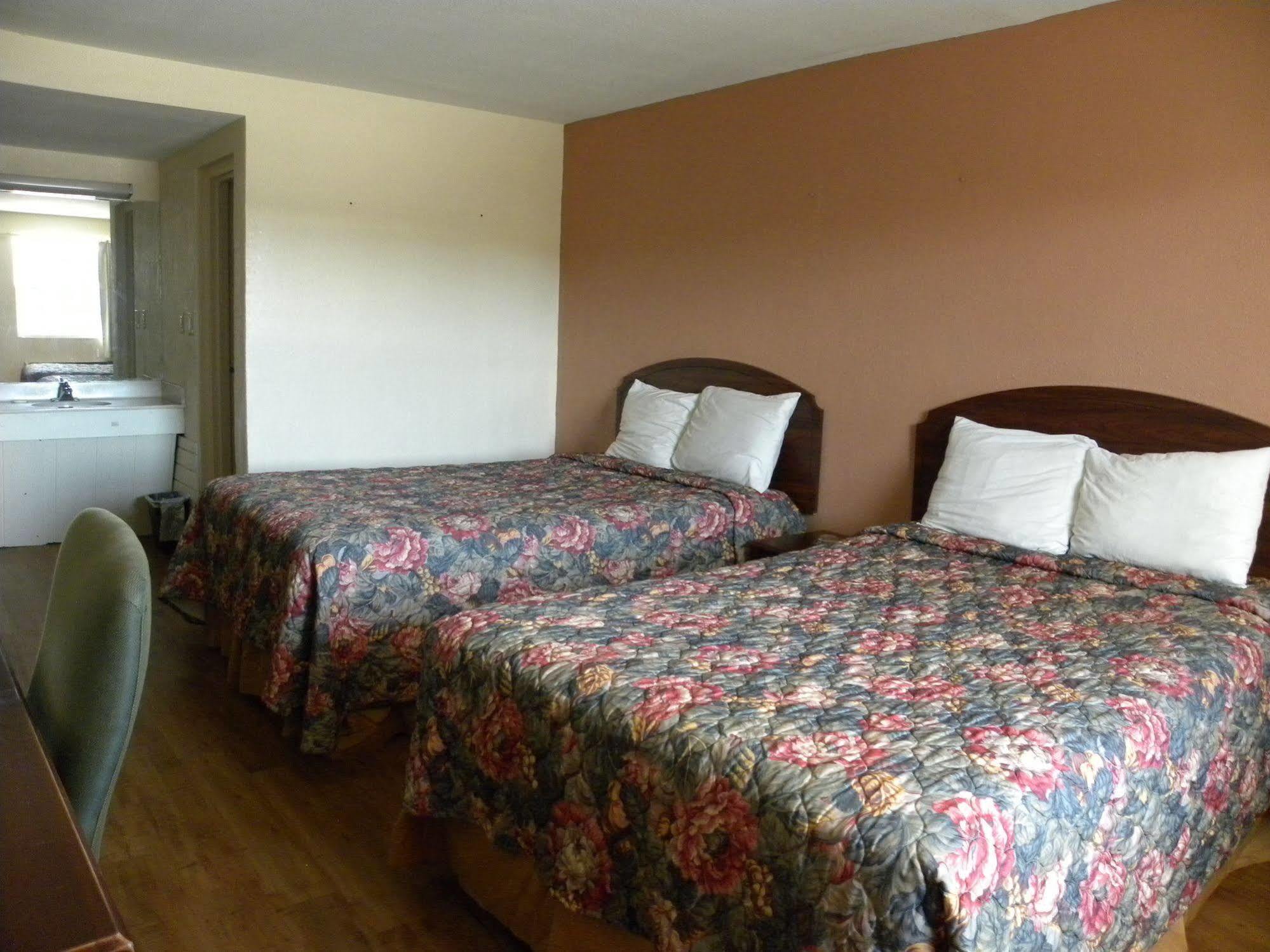 Guest Inn Rogers Esterno foto