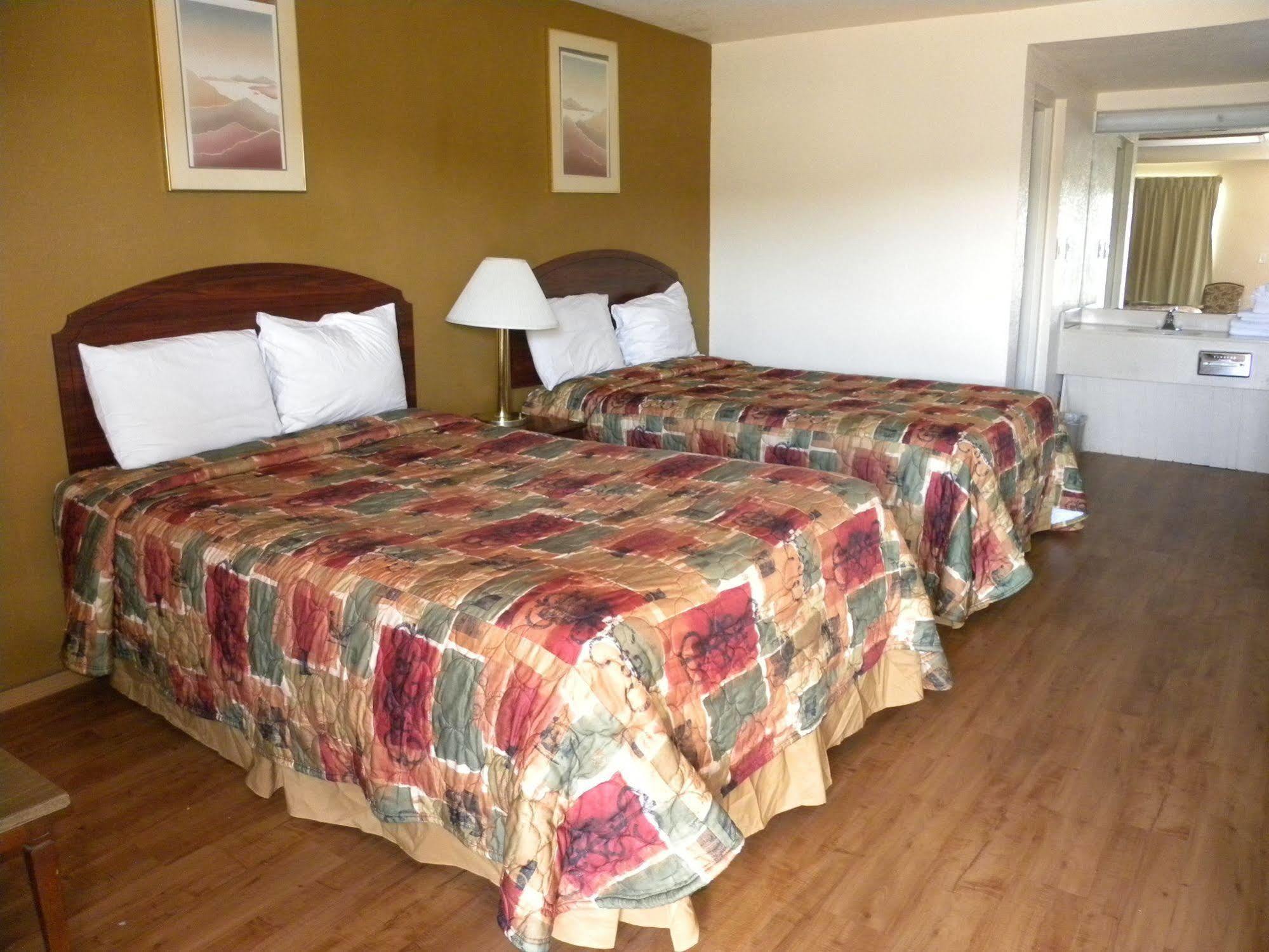 Guest Inn Rogers Esterno foto