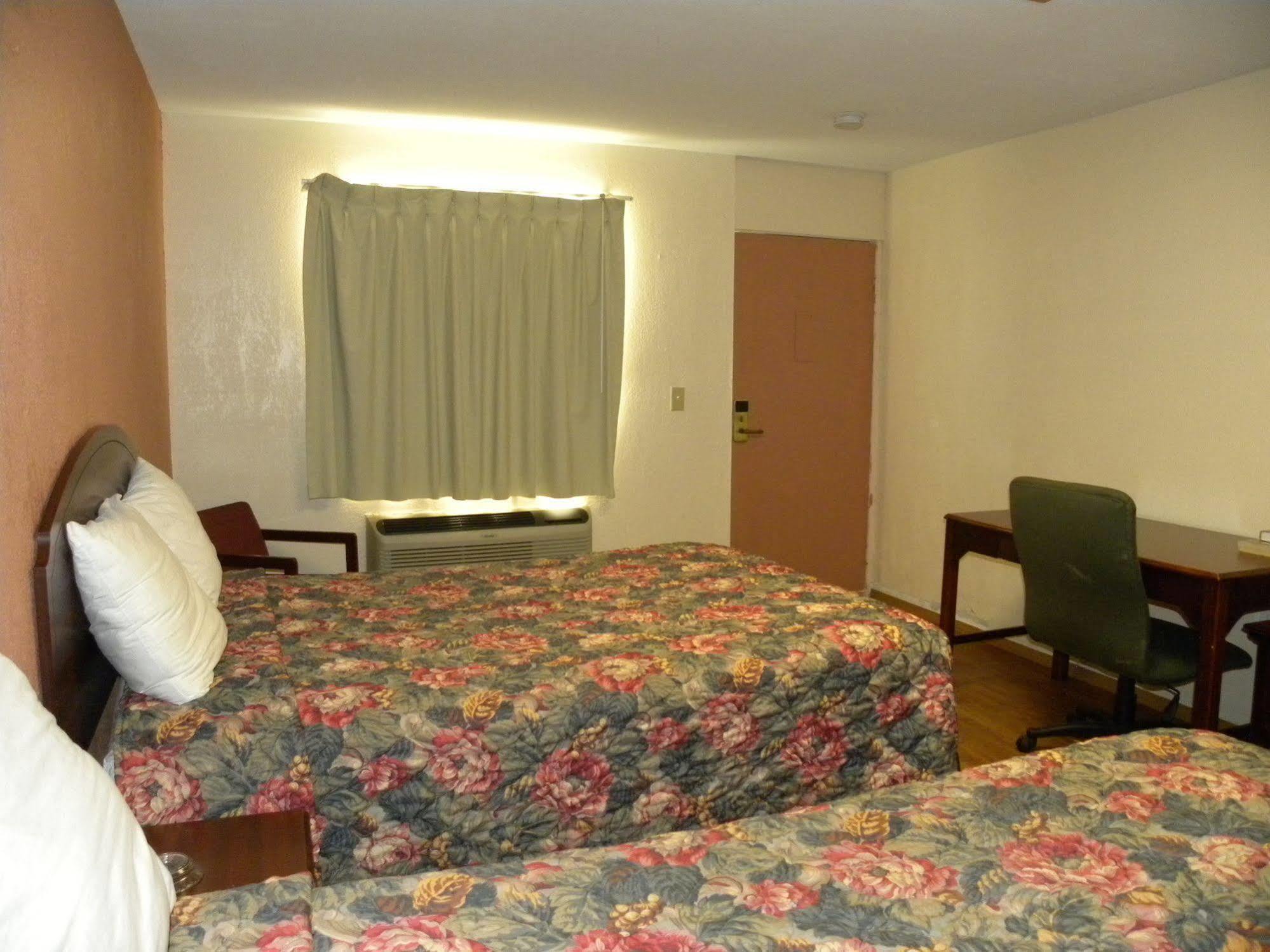 Guest Inn Rogers Esterno foto